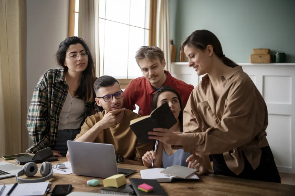 colleagues reading from book study session